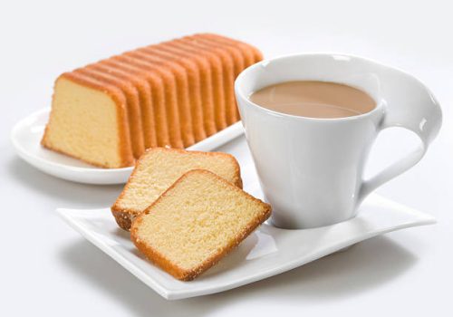 Sponge cake with a cup of coffee